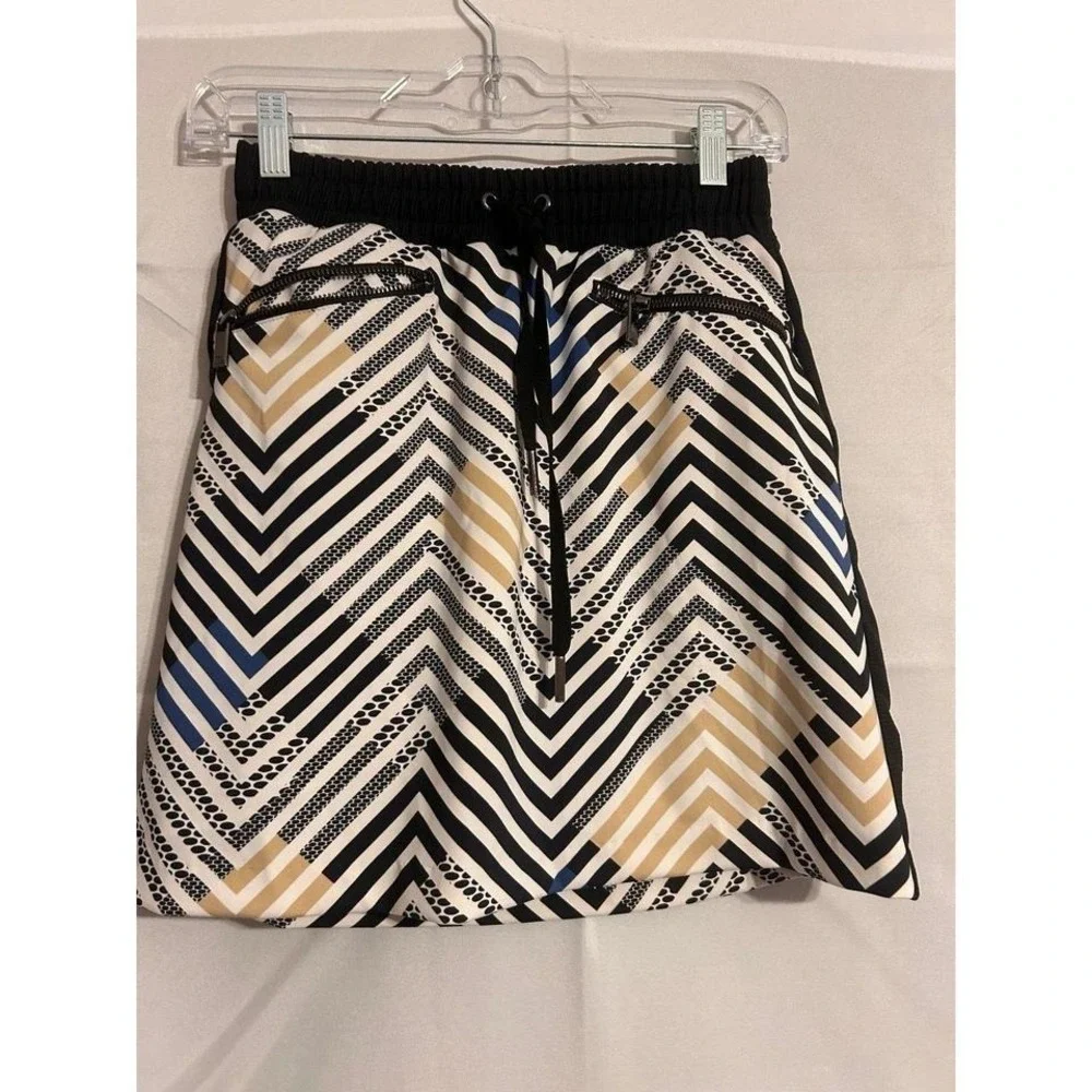 Tall brand tennis/pickleball skort like new XS‎ w pockets floral pleaded